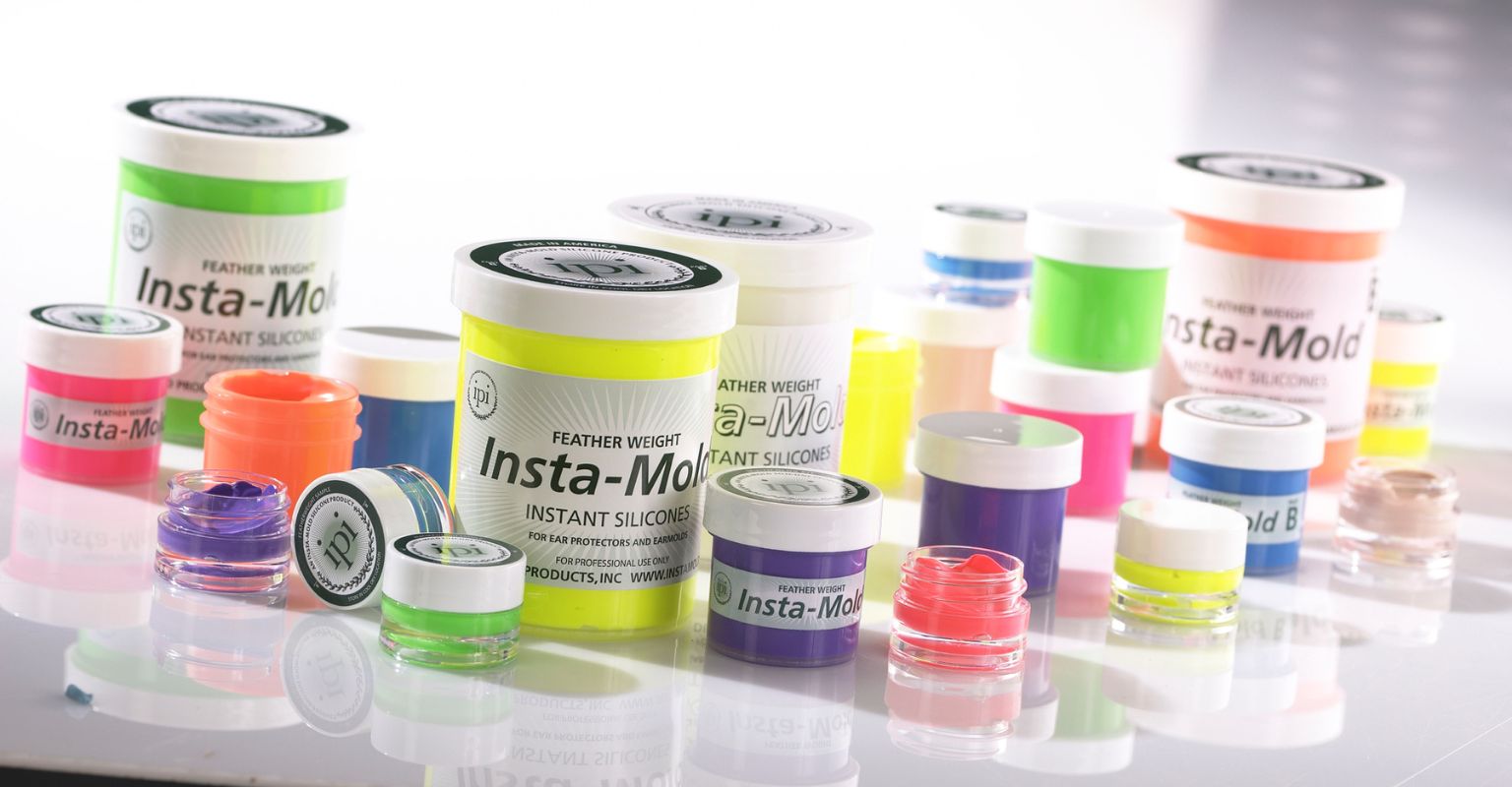 Jars of Instamold with different colours